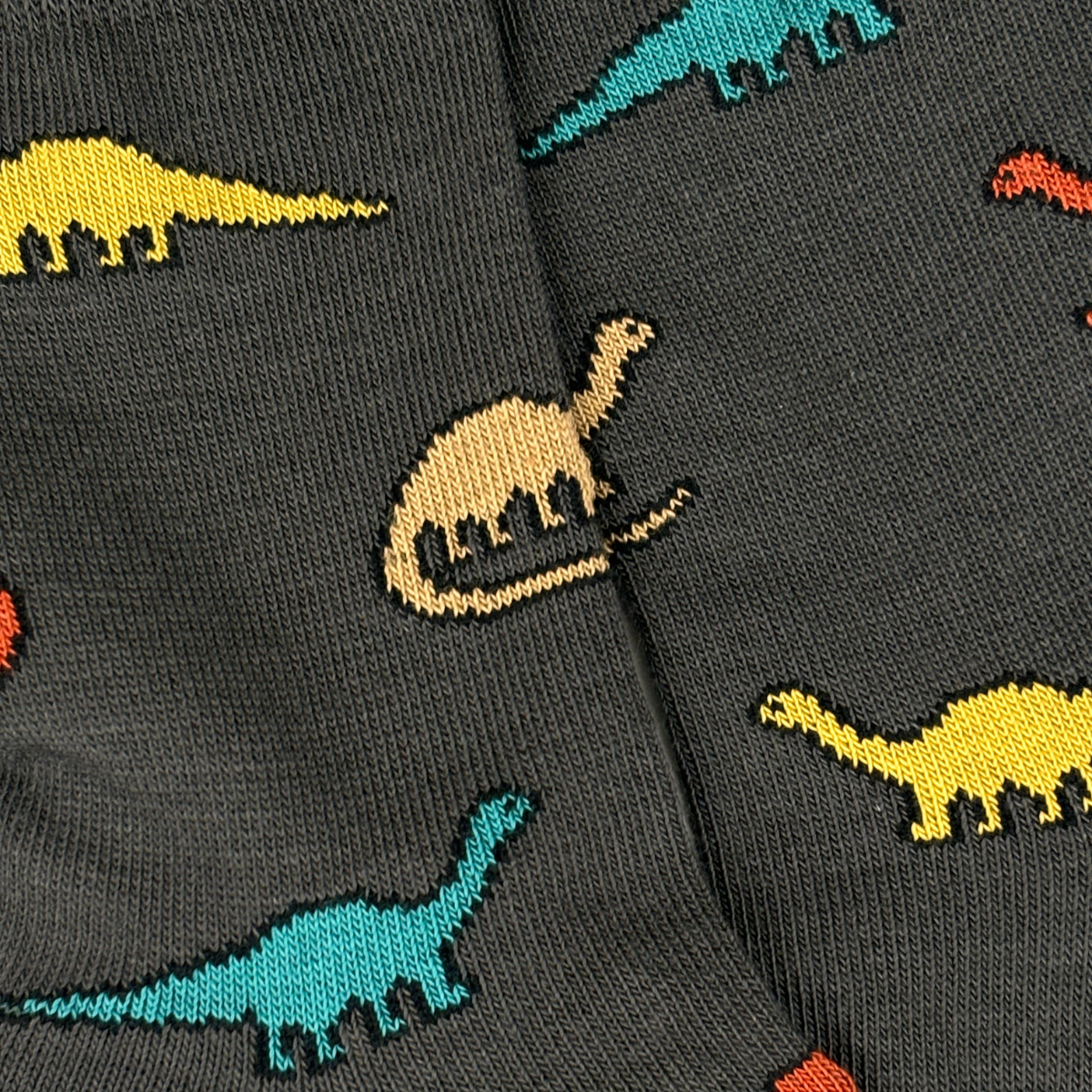 Calcetines con dinosaurios de colores